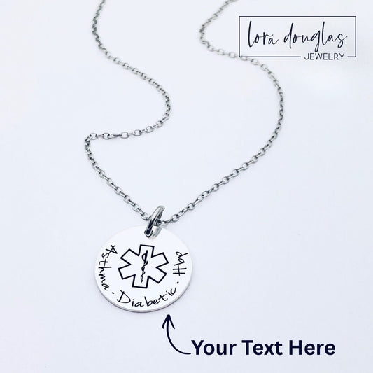 personalized medical alert necklace with custom engraved medical ID pendant in stainless steel featuring medical symbol and personalized text, minimalist round disc necklace designed for everyday wear and emergency identification jewelry
