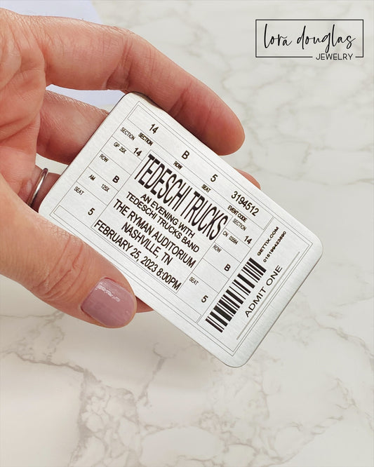 Perfect as shadow box inserts or personalized wallet cards, these custom metal concert, festival, gig, and event tickets offer a lasting tribute to unforgettable experiences.
