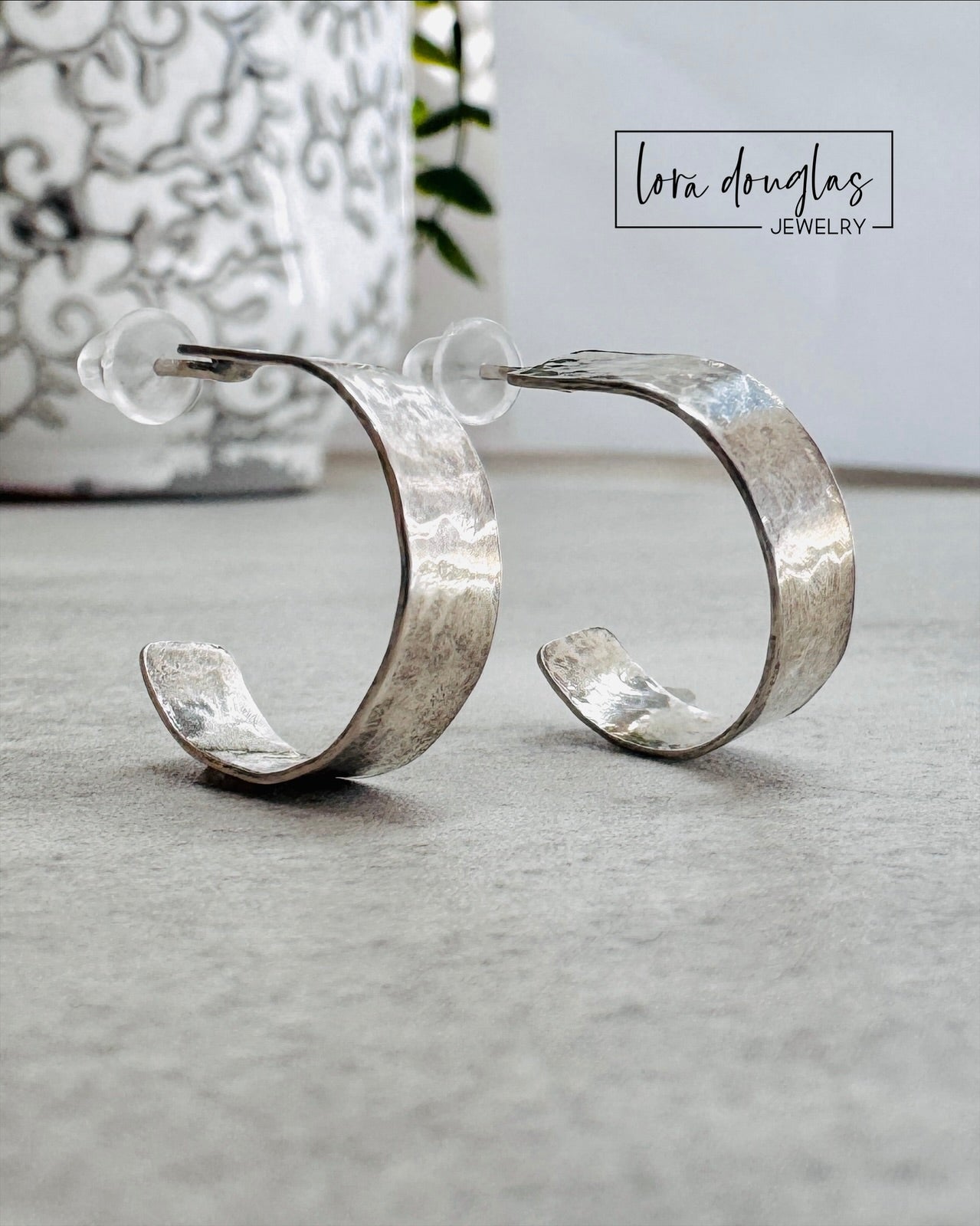 classic sterling silver hoop earrings with hammered texture. lightweight earrings. 