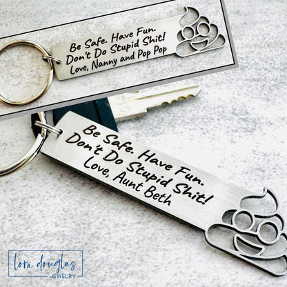 Metal keychain with engraved text and design on a light gray background
Don't Do Stupid Shit Poop Emoji Cutout Keychain, Personalized Funny Stainless Steel Keyring, Customize With Your Name, Gift Bag Included