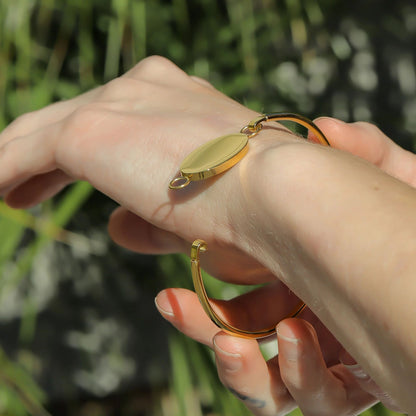 Personalized gold oval bangle bracelet engraved with your actual handwriting