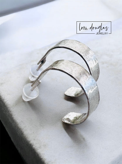 classic sterling silver hoop earrings with hammered texture. lightweight earrings. 