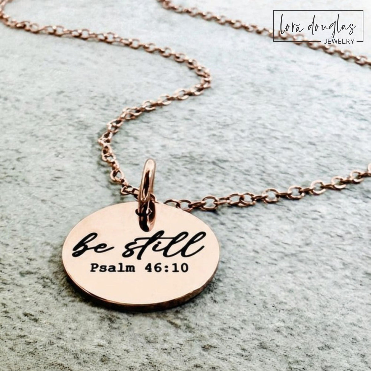 Be Still scripture jewelry featuring the familiar message from Psalm 46 permanently laser engraved on a round disc, a meaningful Christian gift for a daughter, mother, sister, friend, or Bible study member.