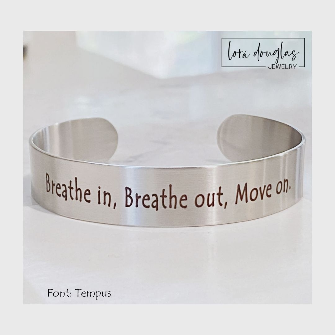 Custom coordinate bracelet engraved with a meaningful location, date, or personal message on an adjustable stainless steel cuff, available in silver, gold, and rose gold for commemorating a significant place or occasion.
