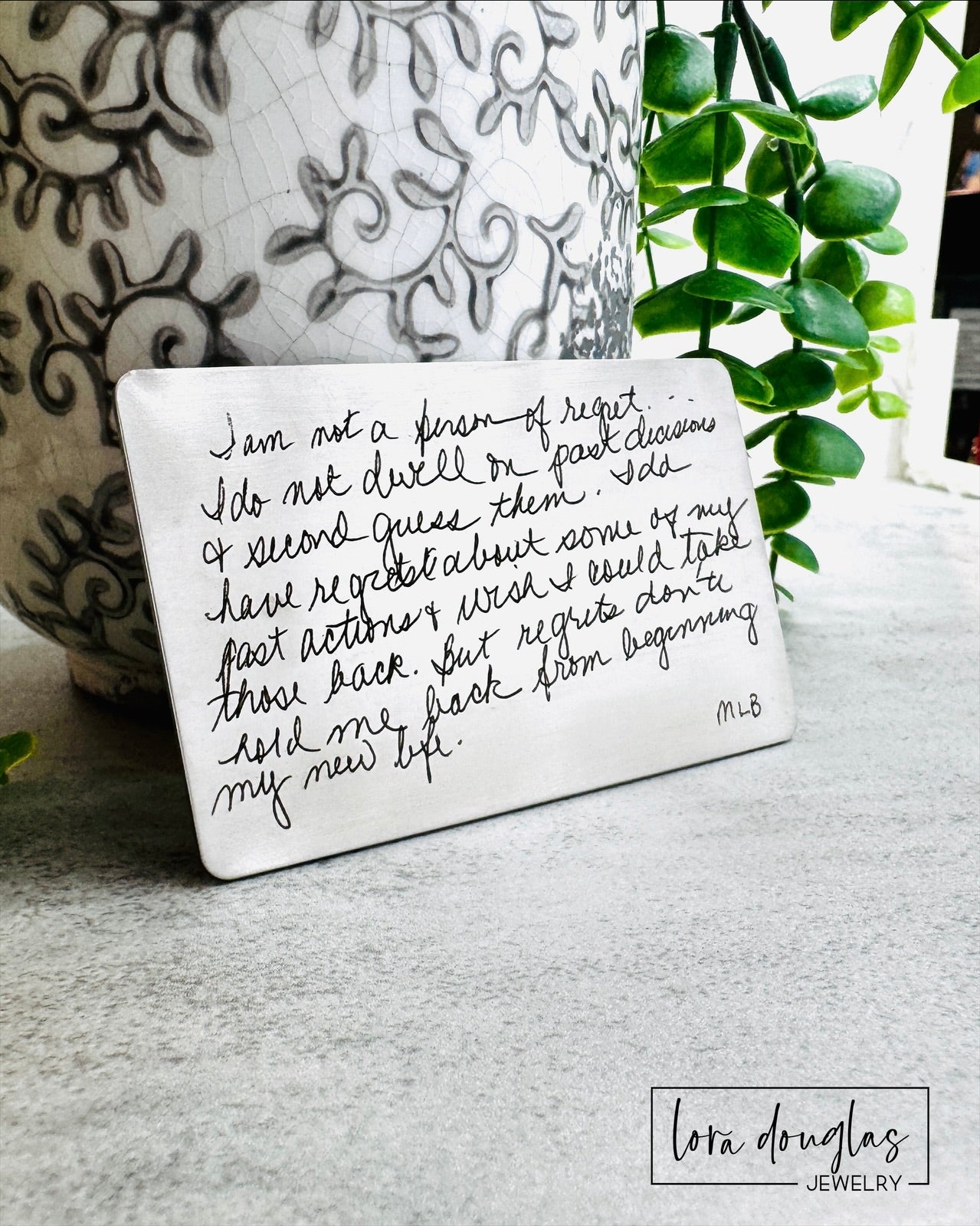 Custom memorial wallet card engraved with the handwriting and signature of a loved one who has passed away. A comforting sympathy gift for preserving a meaningful note and keeping their words close every day.