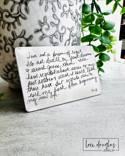 Custom memorial wallet card engraved with the handwriting and signature of a loved one who has passed away. A comforting sympathy gift for preserving a meaningful note and keeping their words close every day.