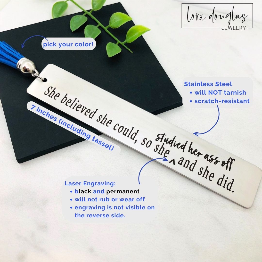 Engraved stainless steel tassel bookmark featuring the humorous quote "She Believed She Could So Studied Her Ass Off And She Did." Perfect graduation gift, student encouragement gift, teacher gift, or study motivation keepsake.