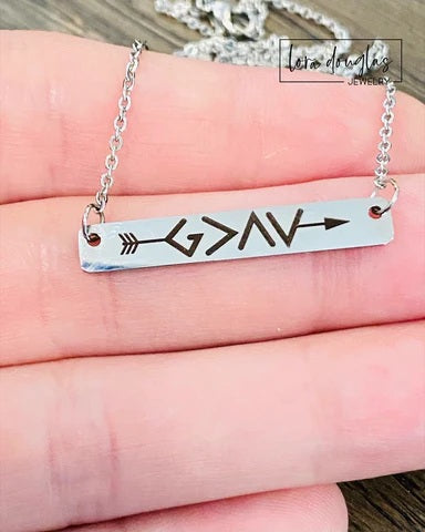 God Is Greater Than The Highs and Lows  bar necklace. Featuring a clever symbol design. Gold or silver bar necklace