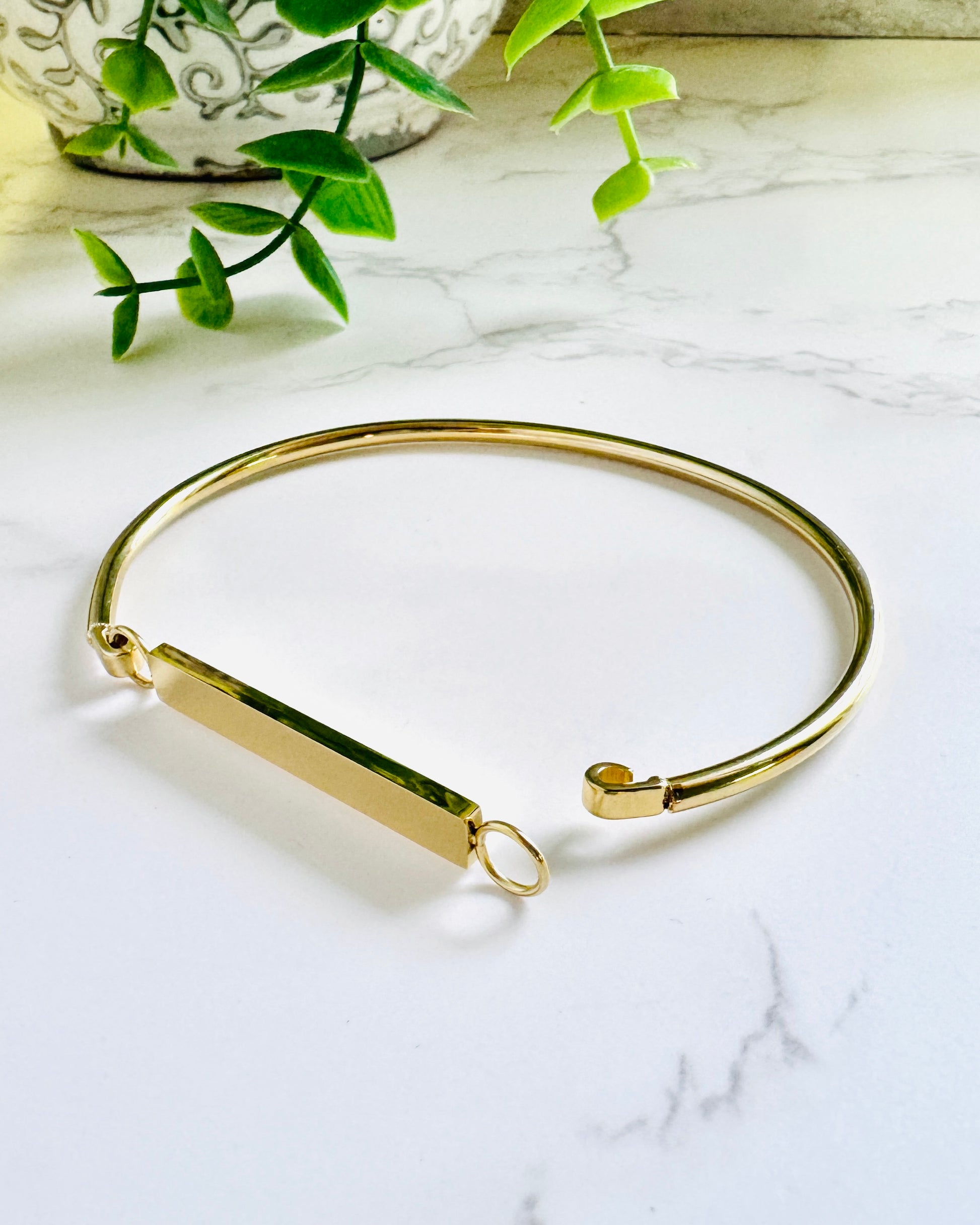 Gold bangle bracelet with hook closure