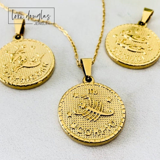 Gold stainless steel Constellation Necklace featuring an engraved zodiac sign pendant with celestial star pattern on a 24 inch chain. Durable astrology jewelry designed for everyday wear and meaningful birthday gifts.