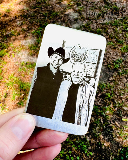 Matte silver stainless steel wallet card engraved with custom handwriting, artwork, a logo, recipe, or photograph. Permanent personalized keepsake suitable for daily wallet carry, tabletop display, or a framed shadow box memorial.