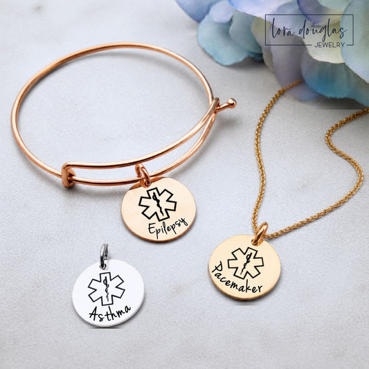 Personalized medical alert necklace with round stainless steel pendant available in silver, gold and rose gold, custom engraved on both sides with medical information and emergency details in your choice of three pendant sizes.

