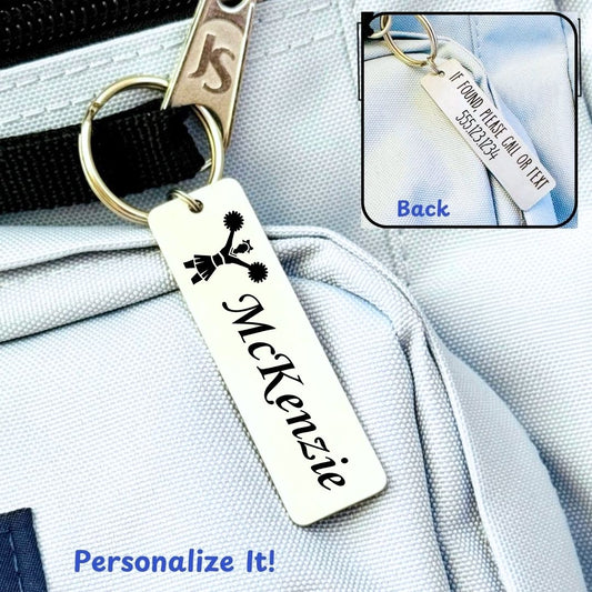 Personalized sports bag ID tag engraved with a student's name and contact information on a compact stainless steel tag, ideal for swim bags, dance bags, cheer bags, team equipment, gym bags, and other easily misplaced belongings