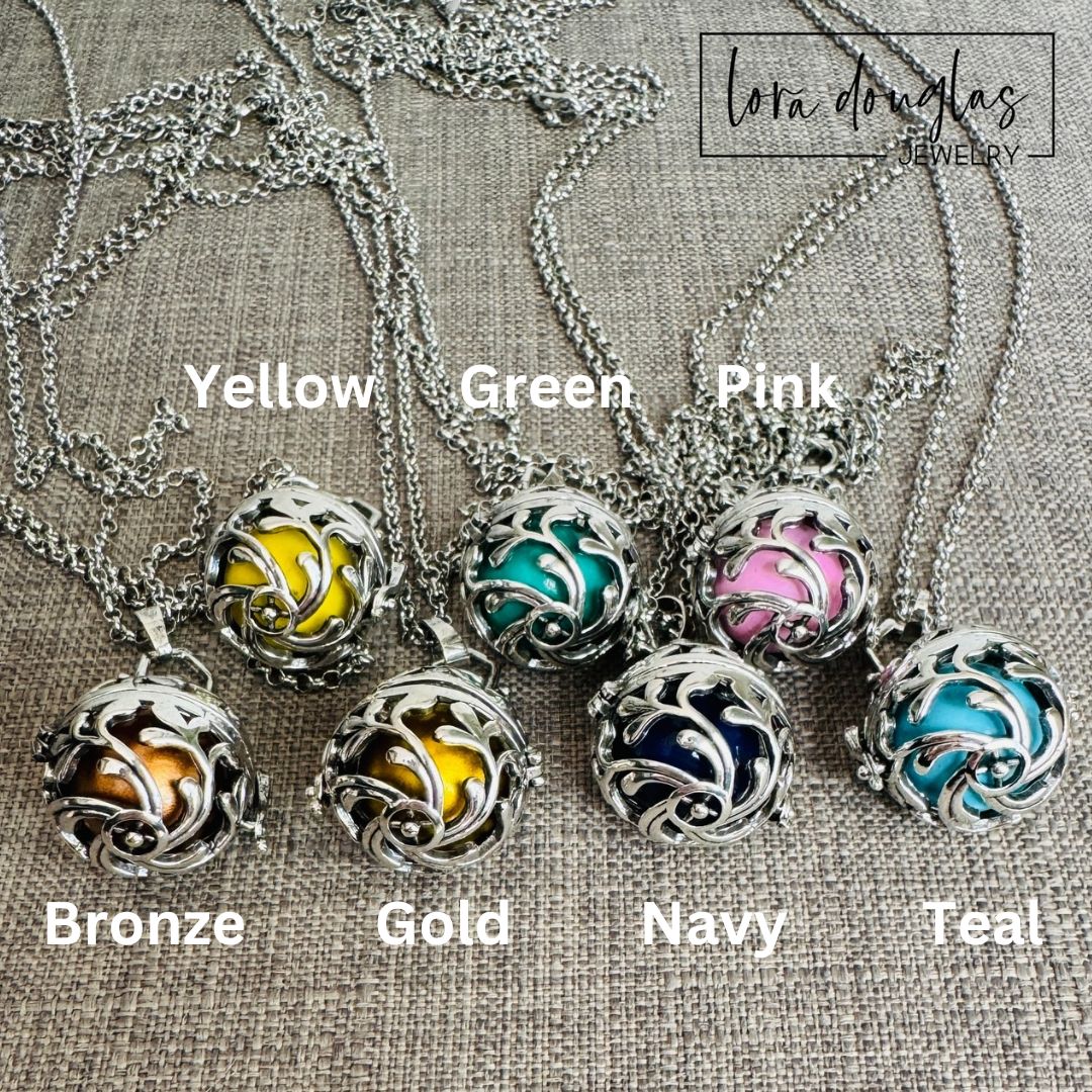 An Angel Caller, also referred to as a “Bola” or “Harmony Ball," is an ancestral jewelry that has been celebrated for centuries in different cultures. The pendant contains a metal ball that emits a subtle and harmonious chime when shaken, that brings calm and soothing. Legend has it that the soft jingling sound, that is unique for each Bola has the power to call the Guardian Angel of the wearer to provide them protection and comfort.