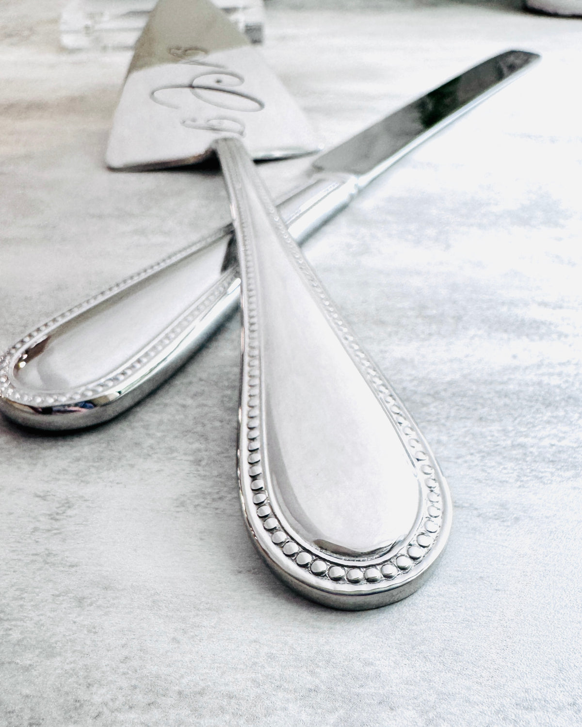 Reed & Barton Lyndon personalized cake knife and server set with permanent laser engraving, a distinctive first birthday keepsake designed to become part of annual birthday celebrations and a future wedding day