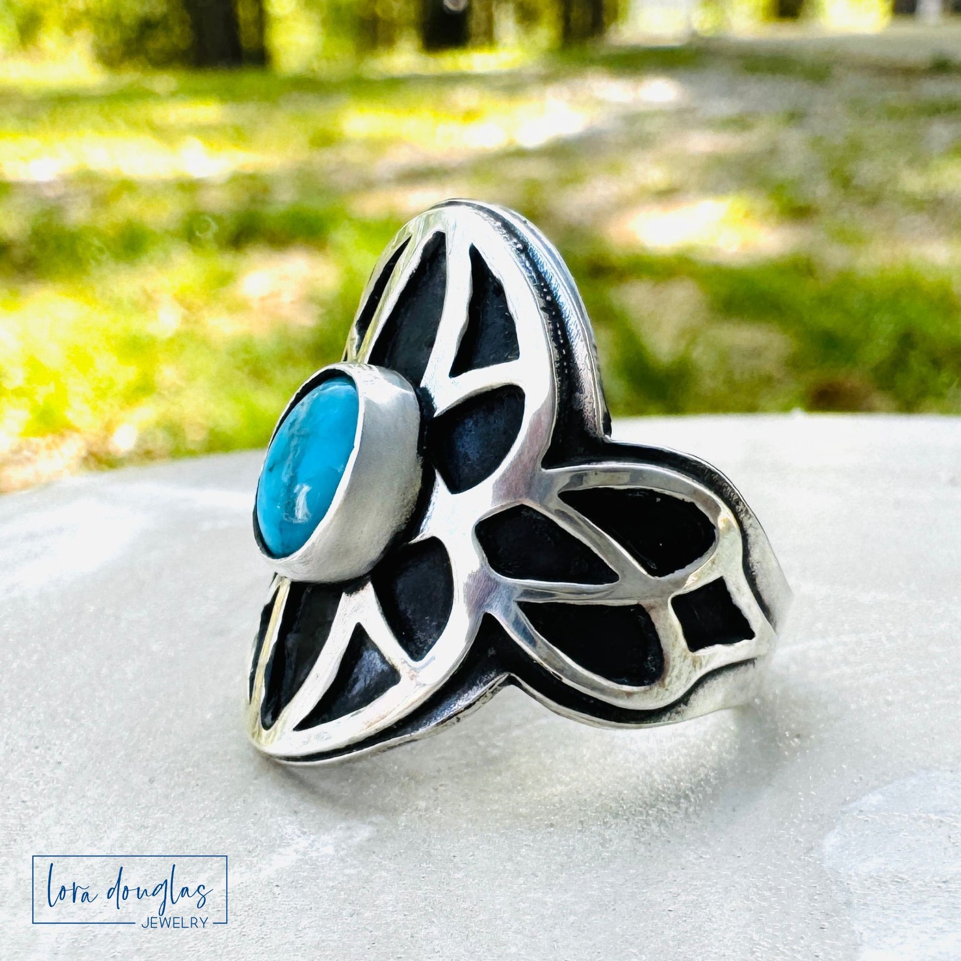 Side view of handcrafted sterling silver turquoise ring