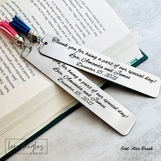 Stainless steel bookmark engraved with "Thank You for Being a Part of Our Special Day" and personalized with the couple's names and wedding date. Thoughtful wedding favor or wedding party gift for bridesmaids, groomsmen, readers, officiants, and honored guests.