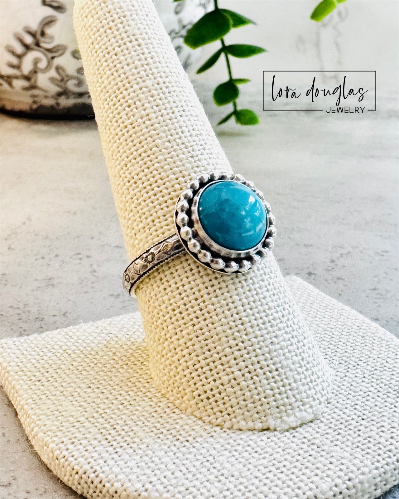 artisan handcrafted sterling silver ring showcasing a natural color Kingsman Turquoise gemstone, 10mm round stabilized cabochon in a classic bezel setting, one of a kind turquoise jewelry piece size 8.75
