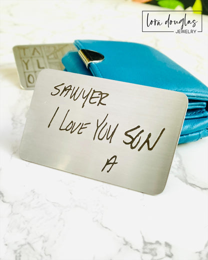Silver stainless steel wallet card with engraved handwriting. Engrave your handwriting on a standard size wallet card