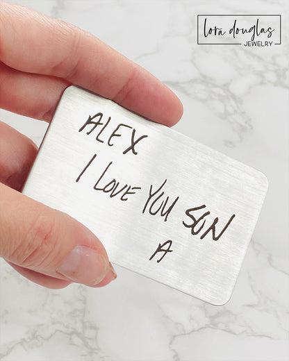 Silver stainless steel wallet card with engraved handwriting. Engrave your handwriting on a standard size wallet card