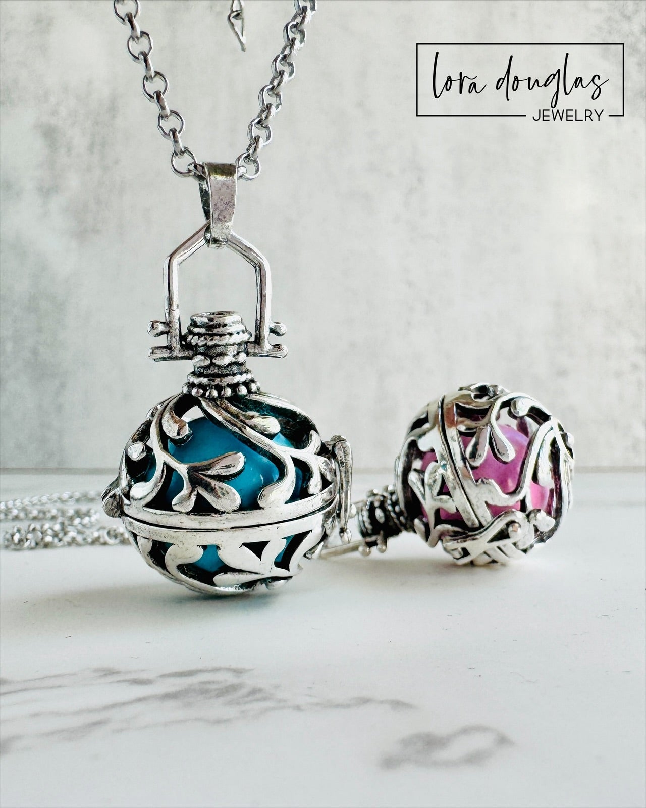 An Angel Caller, also referred to as a “Bola” or “Harmony Ball," is an ancestral jewelry that has been celebrated for centuries in different cultures. The pendant contains a metal ball that emits a subtle and harmonious chime when shaken, that brings calm and soothing. Legend has it that the soft jingling sound, that is unique for each Bola has the power to call the Guardian Angel of the wearer to provide them protection and comfort.