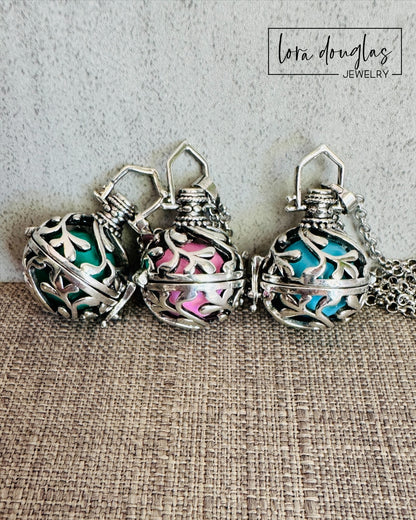 An Angel Caller, also referred to as a “Bola” or “Harmony Ball," is an ancestral jewelry that has been celebrated for centuries in different cultures. The pendant contains a metal ball that emits a subtle and harmonious chime when shaken, that brings calm and soothing. Legend has it that the soft jingling sound, that is unique for each Bola has the power to call the Guardian Angel of the wearer to provide them protection and comfort.