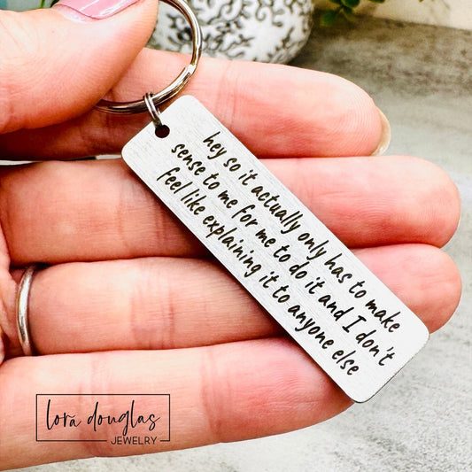  stainless steel keychain features the iconic "365 buttons" TikTok quote laser-engraved in full: "hey so it actually only has to make sense to me for me to do it and I don't feel like explaining it to anyone else." A must-have for independent spirits who live by their own rules and couldn't care less about justifying themselves. 