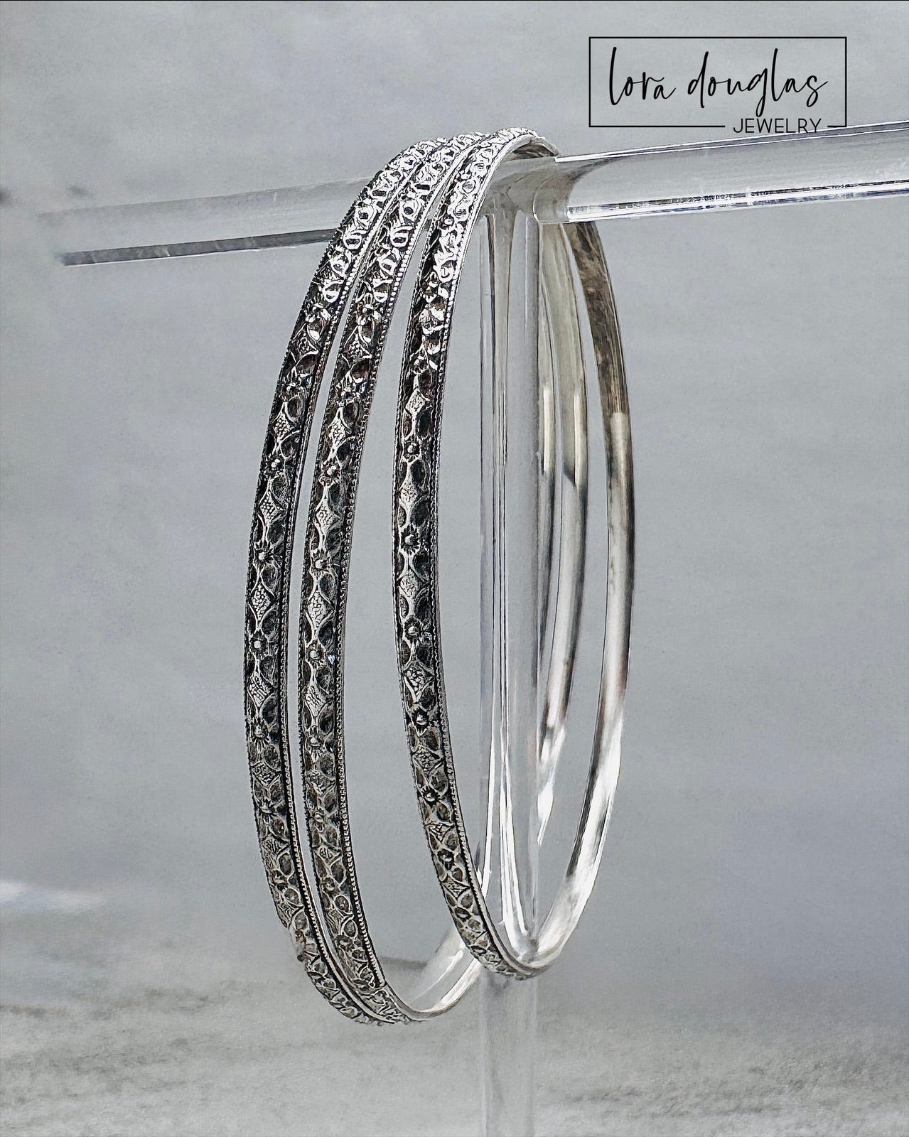 Sterling silver handcrafted bangle bracelet designed for stacking or everyday wear.
