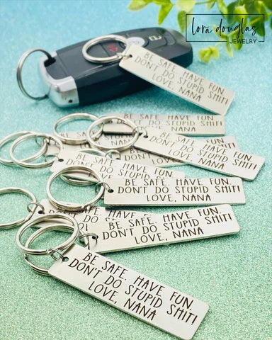 engraved stainless steel keychain with funny message be safe have fun dont do stupid shit love personalized name, brushed silver rectangular keychain with permanent laser engraving and minimalist everyday design