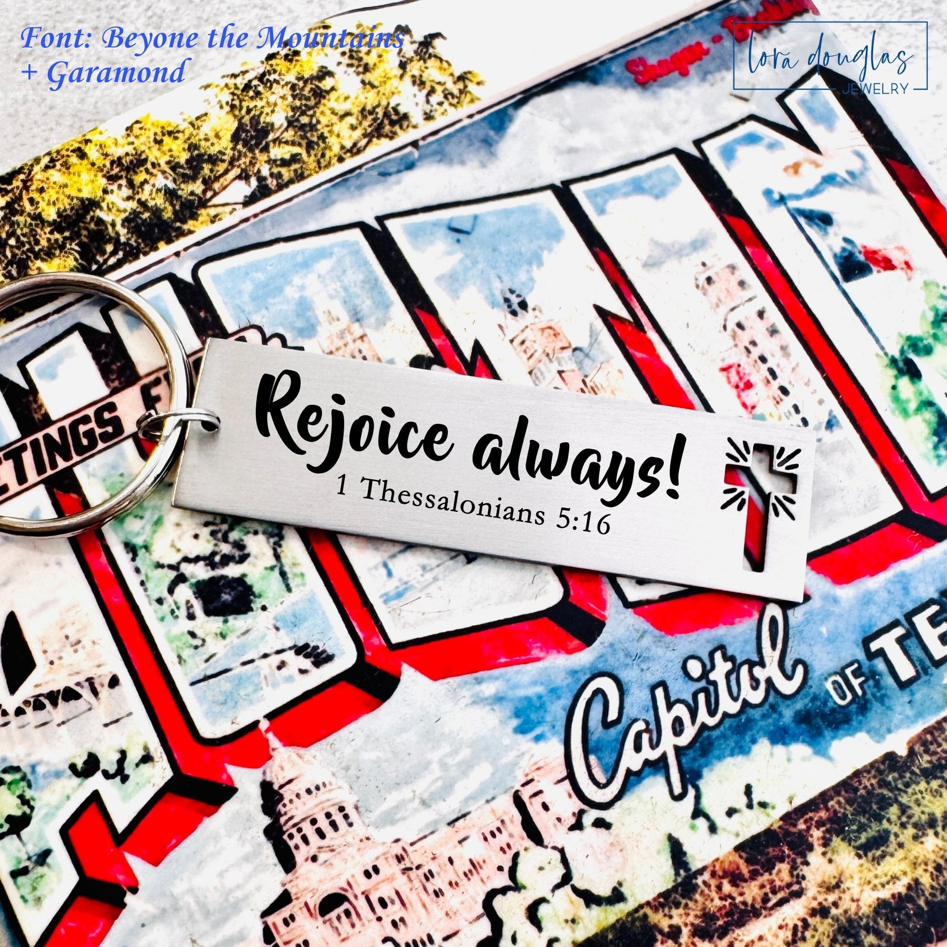 Personalized Christian keychain with engraved scripture text and minimalist cross design highlighting permanent engraving and durable stainless steel material.