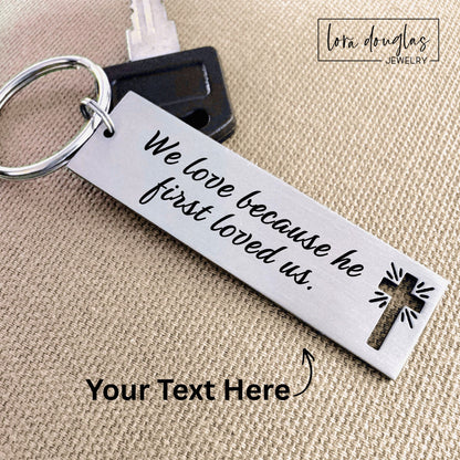 Close up of engraved Christian keychain showing cross cutout detail and custom engraved text on stainless steel tag designed as meaningful faith gift.