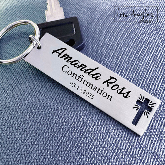 Personalized stainless steel Christian keychain with cross cutout design and engraved scripture message attached to car keys, featuring permanent laser engraving and durable faith inspired design.