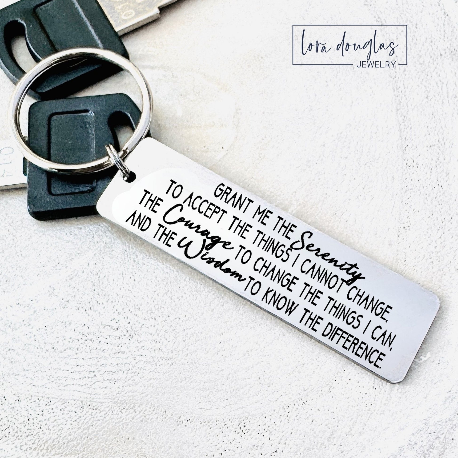 Keychain with engraved with serenity prayer on a white background