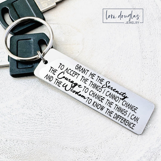 Keychain with engraved with serenity prayer on a white background