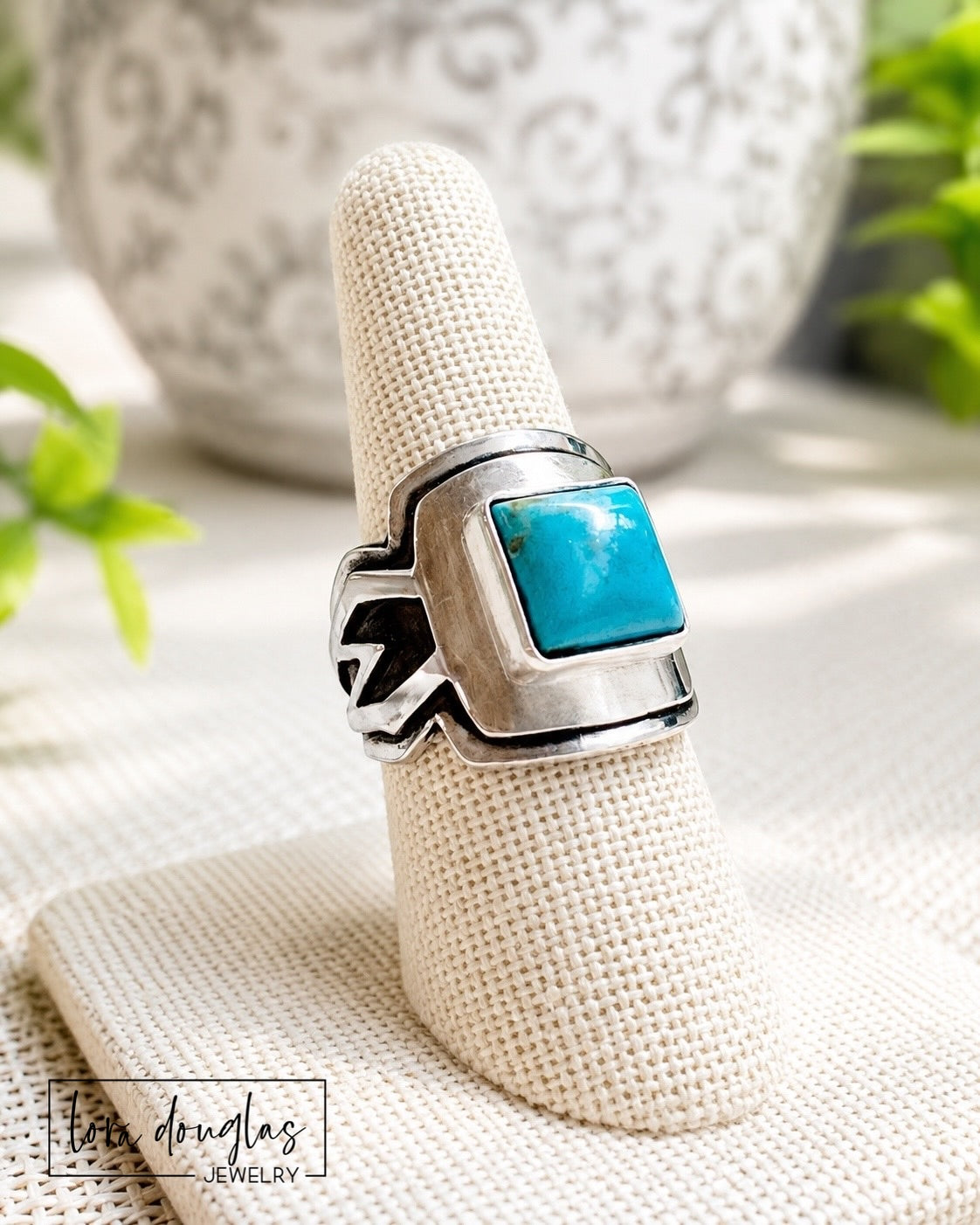 handcrafted Kingsman Turquoise ring featuring a genuine 10mm square turquoise cabochon bezel set in layered sterling silver, artisan saddle ring design with natural blue stabilized turquoise gemstone in US size 8