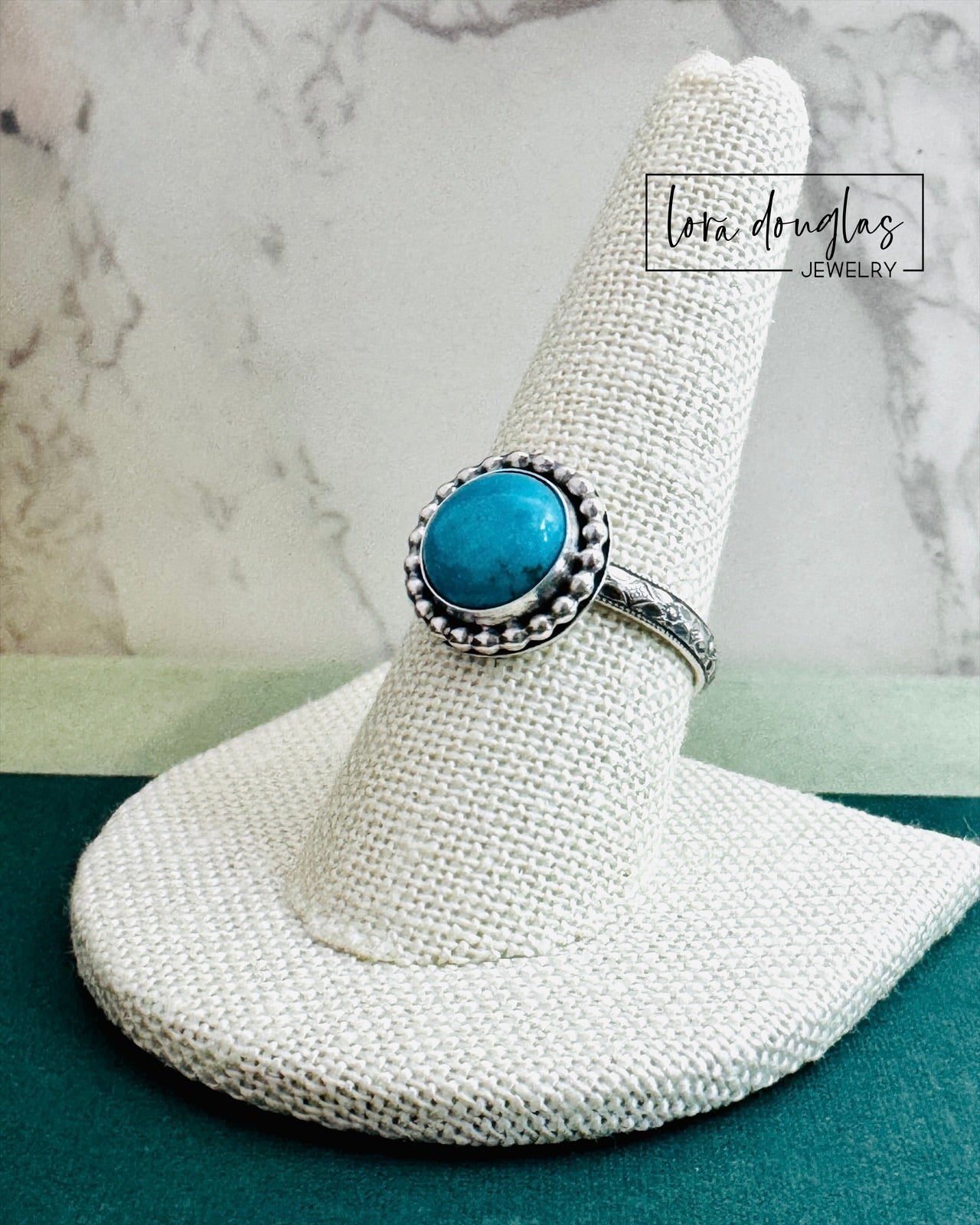 handmade Kingsman Turquoise ring with vivid blue round cabochon stone set in solid sterling silver, artisan turquoise jewelry featuring natural color stabilized turquoise from Arizona in a size 8.75 ring