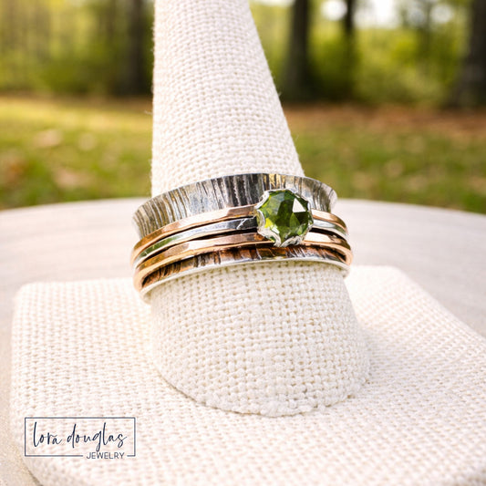 handmade spinner ring gold filled bands and green peridot gemstone