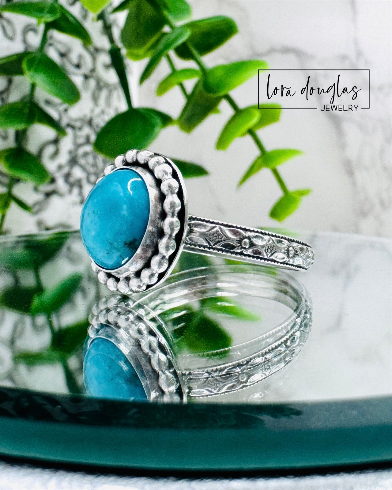 one of a kind sterling silver turquoise ring featuring genuine Kingsman Turquoise, handcrafted bezel setting surrounding a 10mm round natural blue cabochon gemstone with southwestern artisan styling