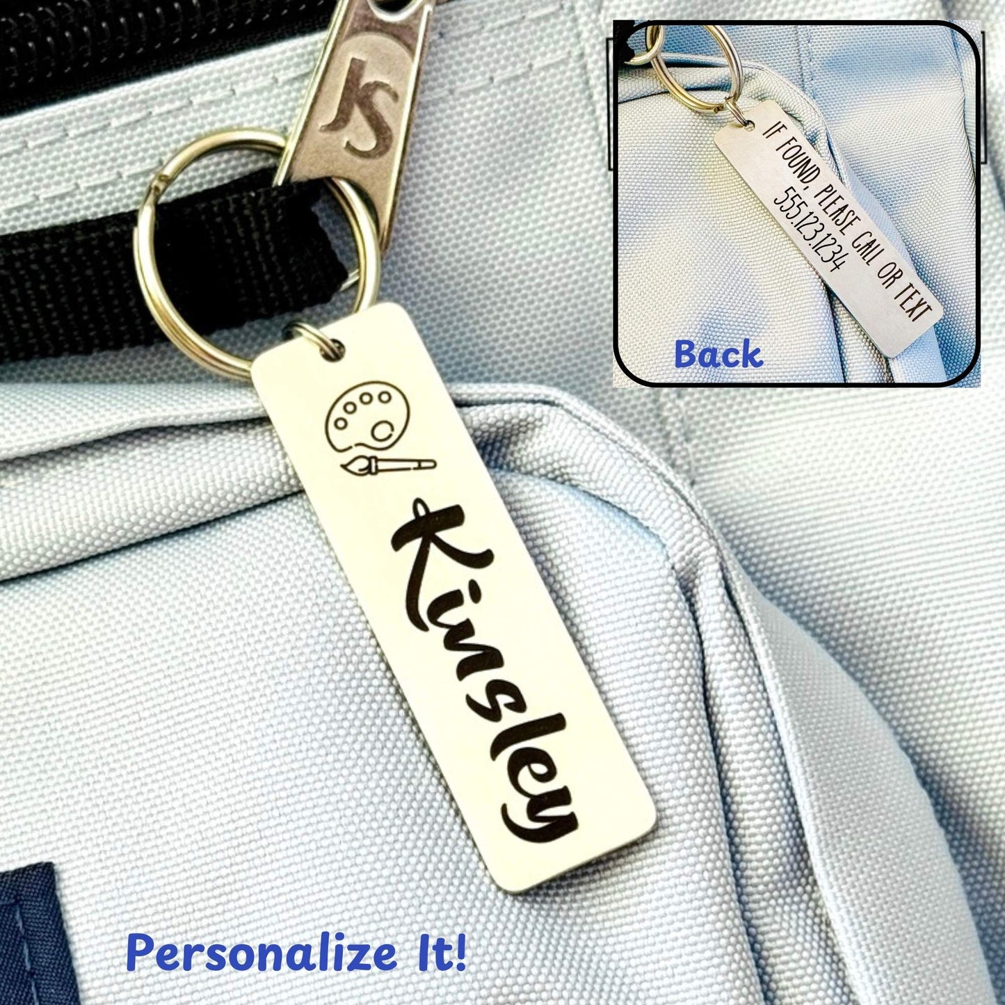 A personalized stainless steel ID tag with the name 'Kinsley' engraved on it, attached to a keychain and displayed on a backpack.