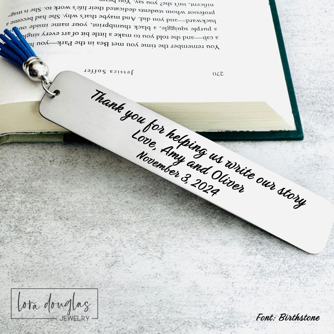 Personalized bookmark with engraved message on a book