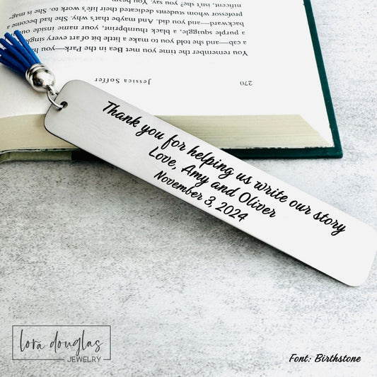 Personalized bookmark with engraved message on a book