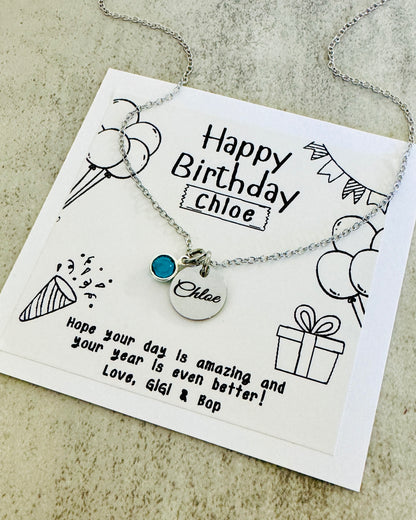 silver necklace with birthstone charm engraved with a name or custom text. personalized birthday card included for gift