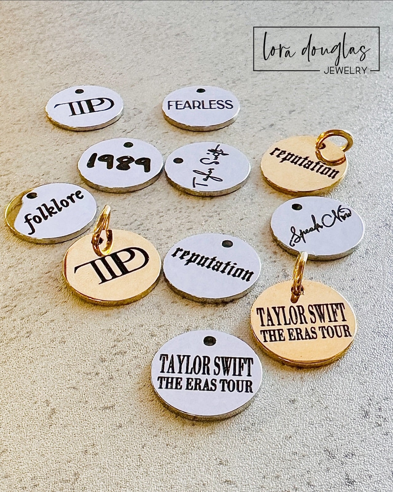 13 Charm Set Includes: Taylor Swift, Fearless, Speak Now, RED, 1989, Lover, Reputation, Folklore, Evermore, Midnights, TTPD, Eras Tour, The Life of a Showgirl
