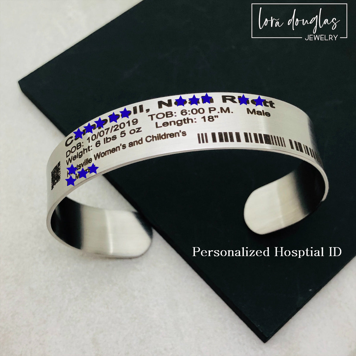 Custom baby birth keepsake bracelet engraved with personalized hospital details such as newborn name, birth date, doctor, patient ID, hospital, birth weight or time, depending on the information selected for the design.
