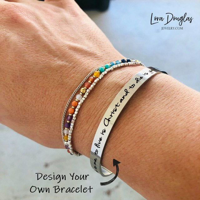 Custom engraved cuff bracelet personalized with a name, date, coordinates, initials, quote, or meaningful message on durable stainless steel, with silver, gold, and rose gold options and your choice of font.