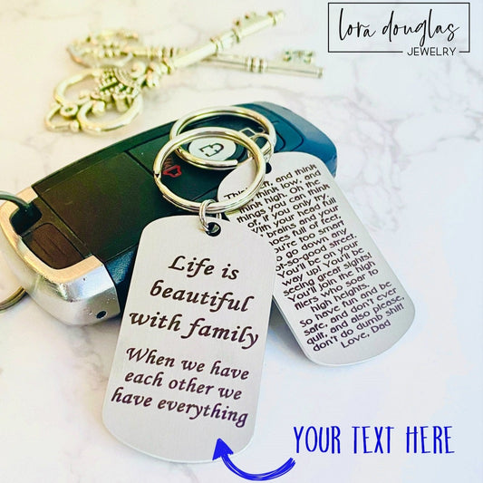 Custom engraved dog tag keychain personalized with your own text on a stainless steel keychain featuring permanent laser engraving. Durable personalized gift for Father's Day, anniversaries, graduations, memorials, and everyday keepsakes.