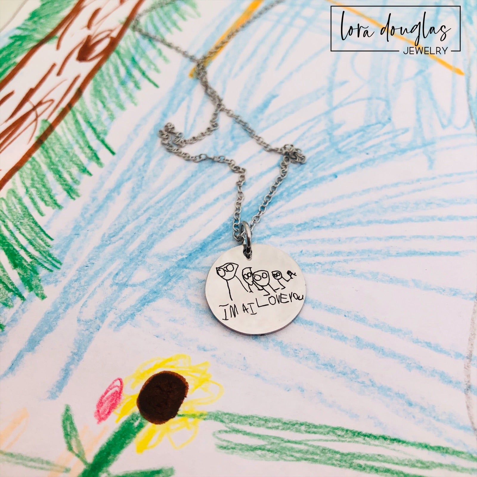 Custom grandma jewelry made with a grandchild's actual drawing engraved onto a stainless steel pendant, creating a personal keepsake necklace, charm, or bangle bracelet in silver, gold, or rose gold with optional back text.
