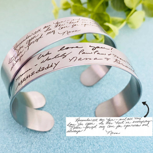 Custom handwriting cuff bracelet engraved with a real signature, handwritten note, or meaningful message. Personalized stainless steel memorial jewelry available in silver, gold, and rose gold for sympathy, anniversaries, and remembrance.