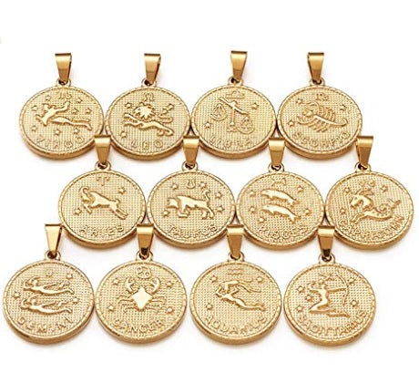 Detailed view of a gold stainless steel Constellation Necklace displaying an engraved zodiac sign and star pattern. Celestial pendant necklace designed for horoscope enthusiasts and everyday jewelry collections.