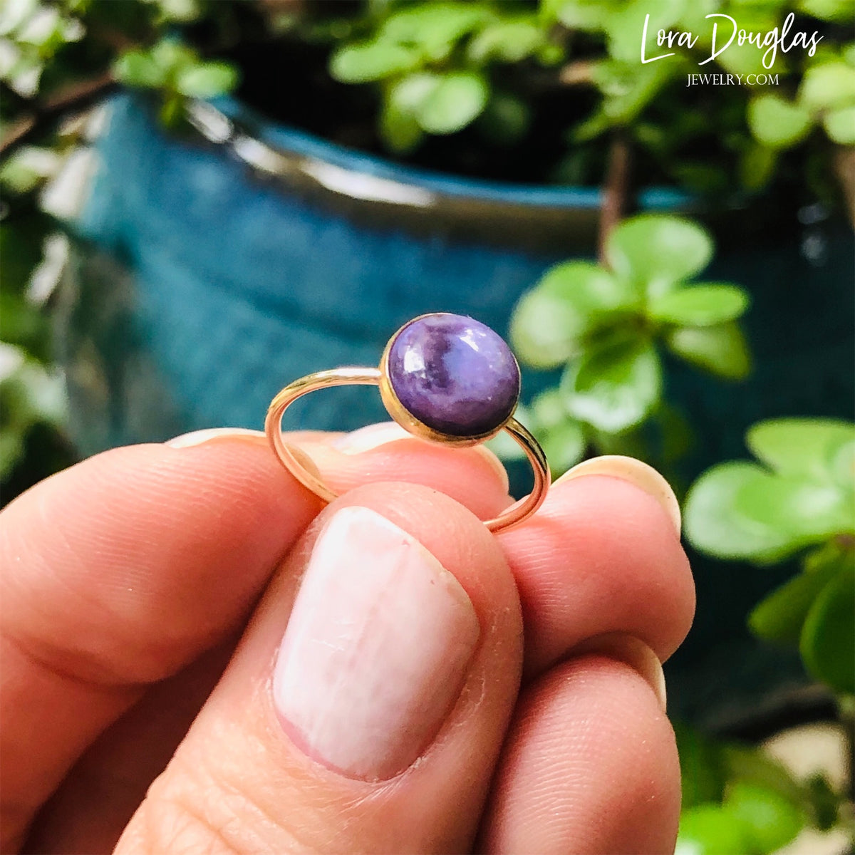 Detailed view of an 8mm natural charoite gemstone set in 14/20 gold filled, showing the distinctive purple stone and warm gold setting of this finished size 6 ring for natural gemstone jewelry collectors.
